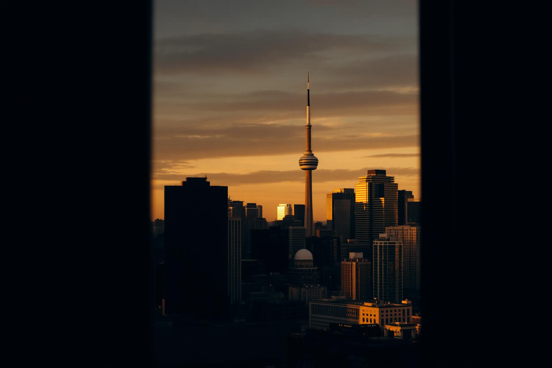 Toronto skyline at golden hour viewed from a law office window